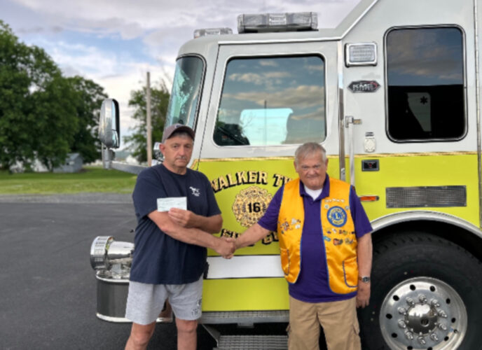 Howard Area Lions donate  to Walker Township Fire Co.